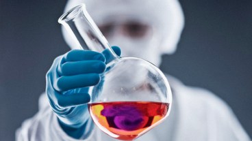 Scientist performing experiment